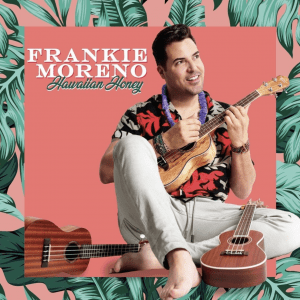 A man plays a ukulele, smiling, with two more ukuleles and text "FRANKIE MORENO Hawaiian Honey."