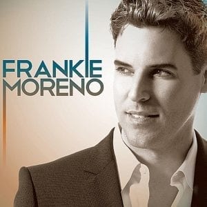 A man in a suit jacket and white shirt smiles, looking right, with "FRANKIE MORENO" on the left.