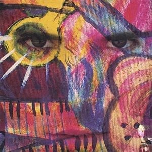 A colorful, abstract painting with two human eyes visible through yellow and dark pink brushstrokes.