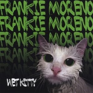 A wet white cat with large green eyes and a pink nose looks forward, with "FRANKIE MORENO" and "WET KITTY" text.