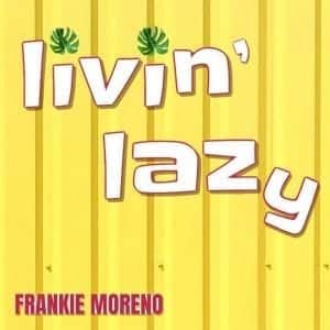 White text with red outlines reads "Livin' Lazy" with two green palm fronds on a yellow corrugated background.