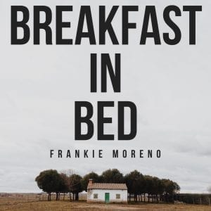 A white house with a green door and brown roof sits among trees under a cloudy sky, with "BREAKFAST IN BED" and "FRANKIE MORENO" text.