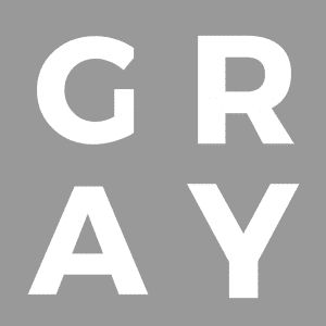 The word "GRAY" is spelled out in large, white, uppercase letters on a solid gray background.