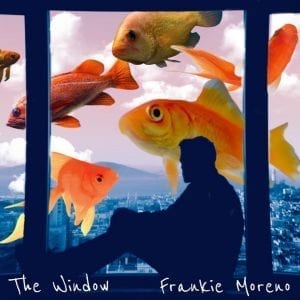 A person's silhouette sits by a window with fish swimming in a cloudy sky; "The Window Frankie Moreno."