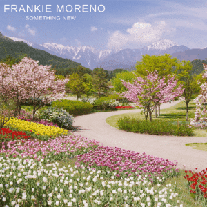 A winding path through a garden with pink cherry blossoms, colorful tulips, and snowy mountains. "FRANKIE MORENO SOMETHING NEW"