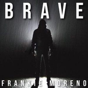 A silhouetted person stands in the rain, illuminated from behind, with "BRAVE" and "FRANKIE MORENO" text.