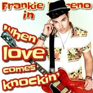 A man in a fedora and floral shirt holds a red electric guitar with text "Frankie in When love comes knockin'".