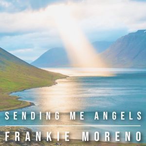 Sunlight beams onto a calm blue lake surrounded by green hills and mountains, with text "SENDING ME ANGELS FRANKIE MORENO".