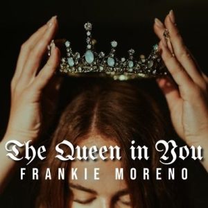 Two hands place a jeweled crown with light blue stones on a woman's head, with text "The Queen in You FRANKIE MORENO".