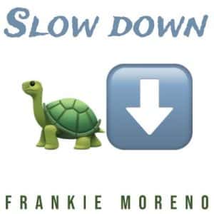 "SLOW DOWN" in blue text above a green turtle emoji and a blue download arrow emoji.