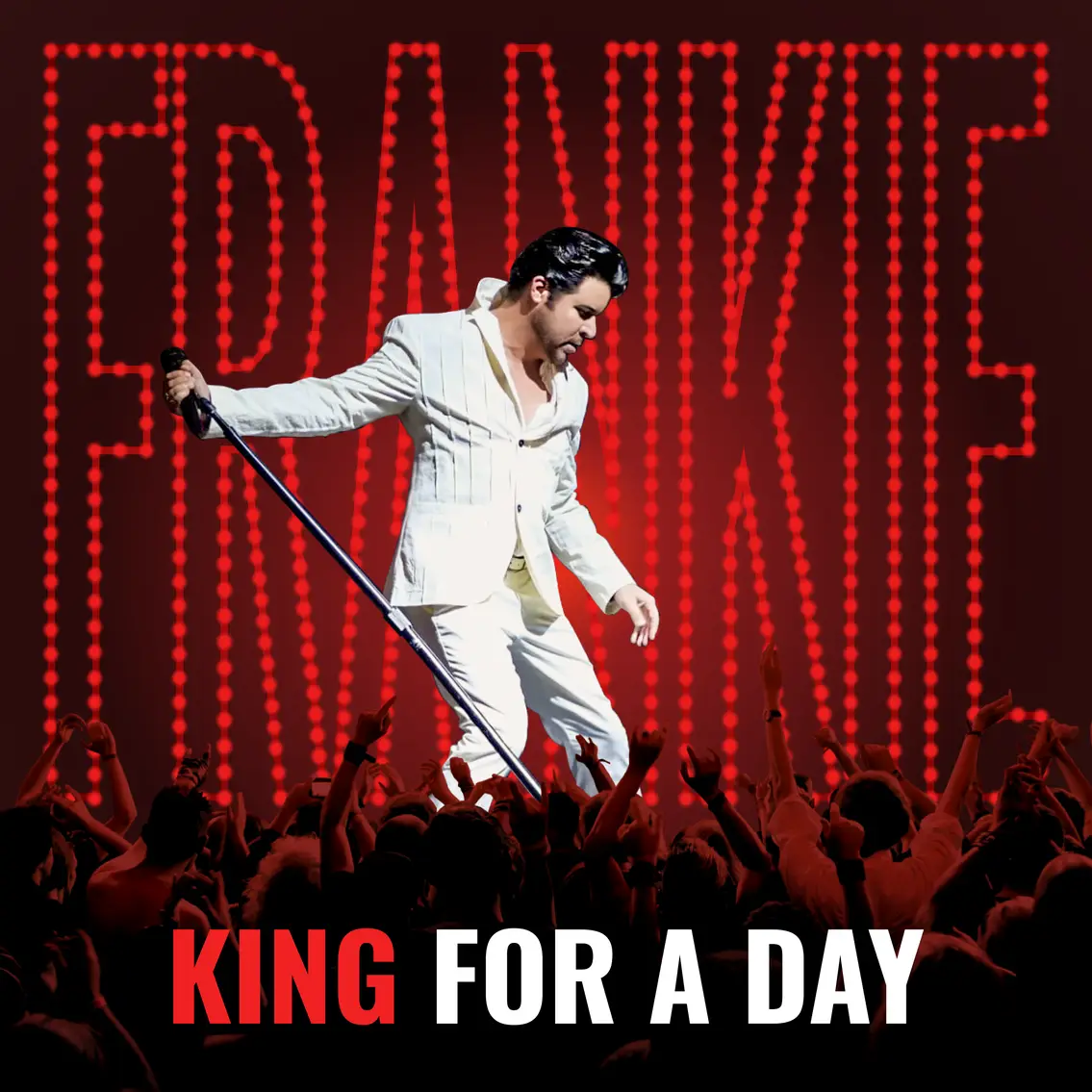 A man in a white suit sings into a microphone on stage with "FRANKIE" in red lights and "KING FOR A DAY" below.