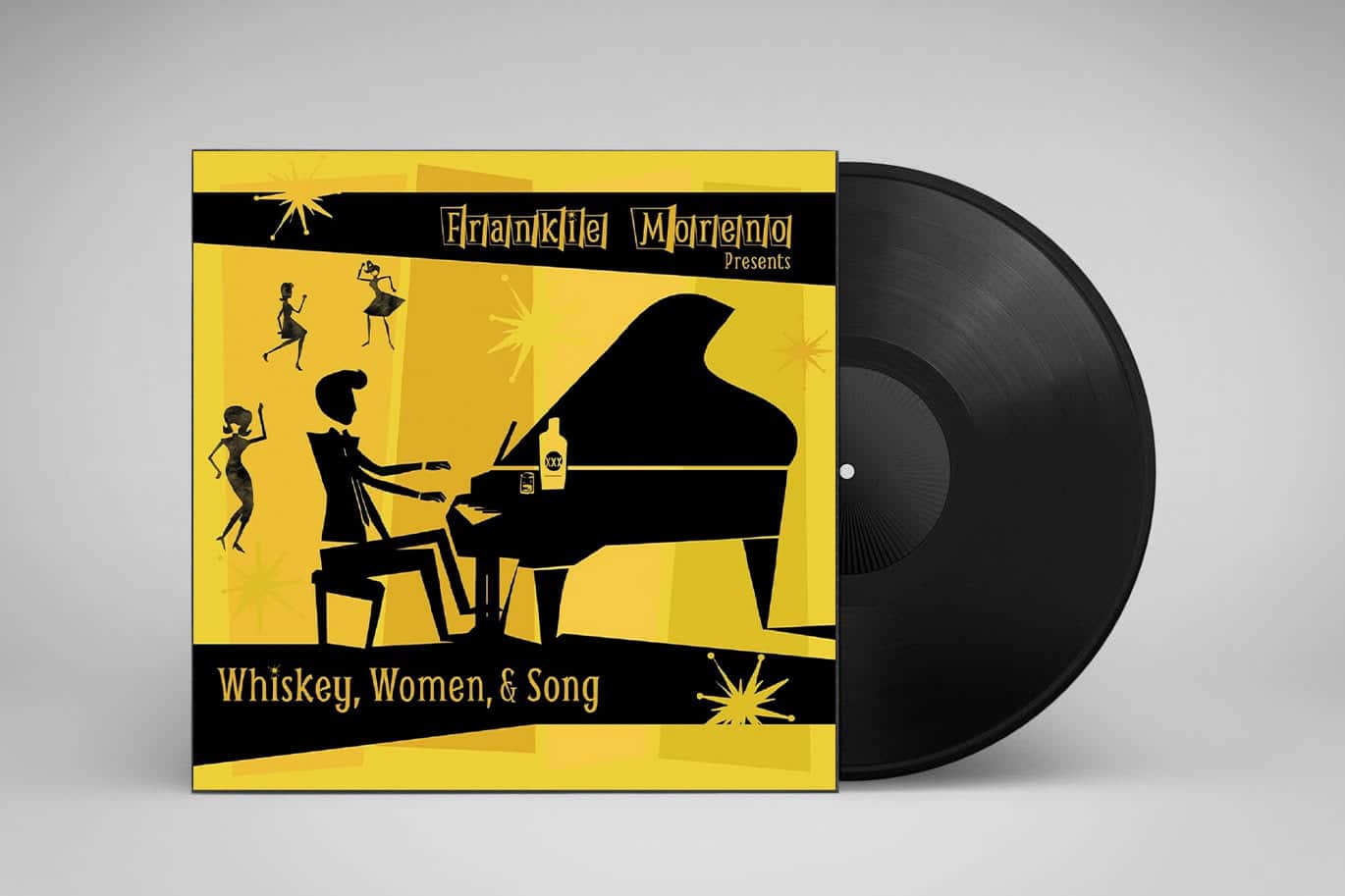 whiskey-women-song-vinyl A black vinyl record partially visible next to its yellow album cover featuring a pianist, dancers, and "Whiskey, Women, & Song."